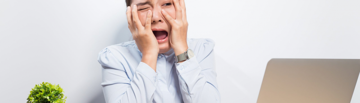 Woman has shock when she look at laptop