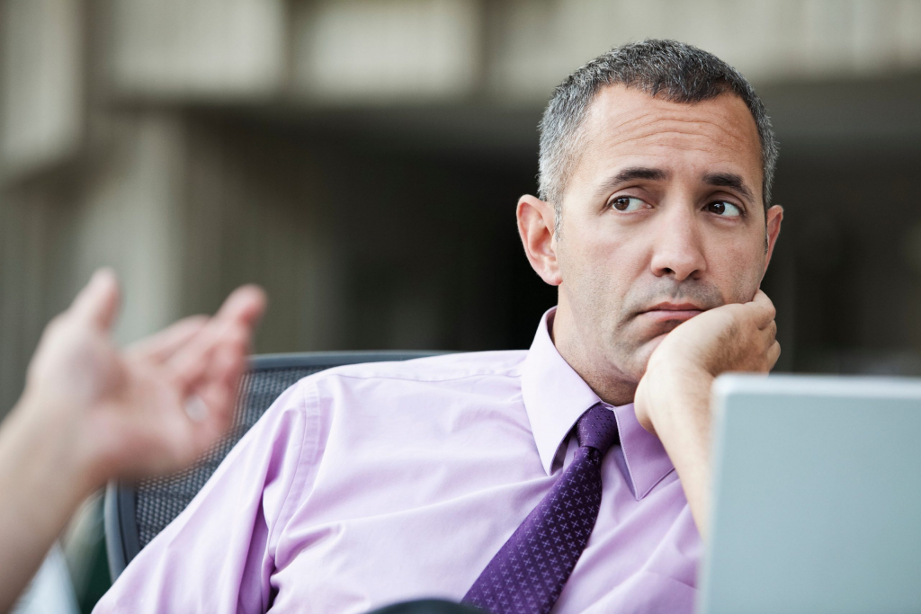 a-caucasian-businessman-pondering-a-problem-while-2026-01-09-10-28-29-utc-1-scaled-1